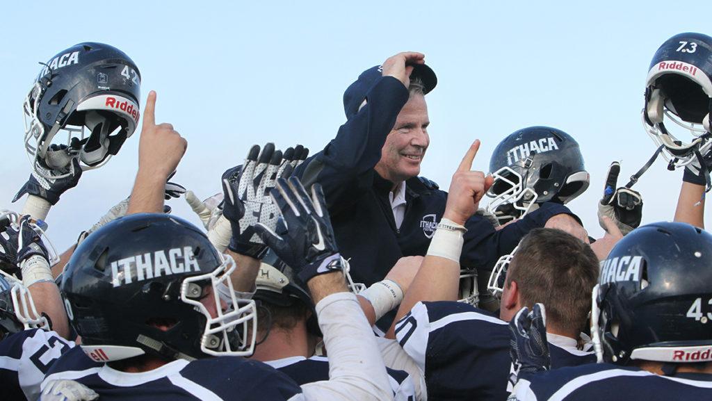 The Ithaca College football team carries head coach Mike Welch off of the field after its 7–0 win over Buffalo State on Nov. 5. This was Welchs final home game of his career.