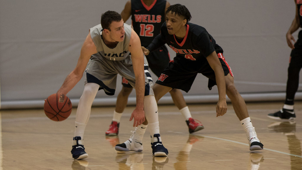 Junior guard Marc Chasin plays against Wells College on Dec. 6. He scored his 1000th point Nov. 19 against SUNY Purchase.