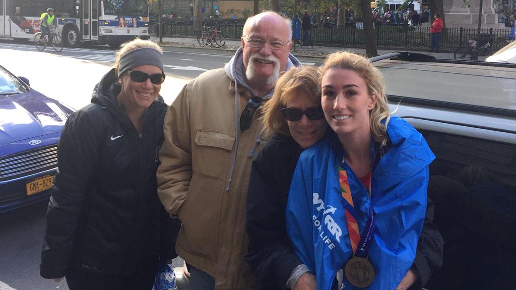 Amanda Aussems with her family after finishing the New York City Marathon on Nov. 6. She raised $2,500 for Playworks, a national nonprofit that focuses on teaching kids through play. 