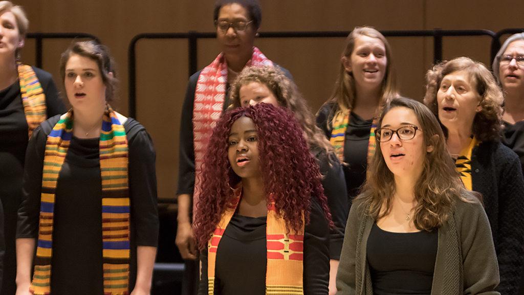 The performers sing “Go Down Moses,” a well-known Negro spiritual, during their rehearsal on Jan. 23. Performers sport Kente cloths from Ghana, purchased by conductor Baruch Whitehead.