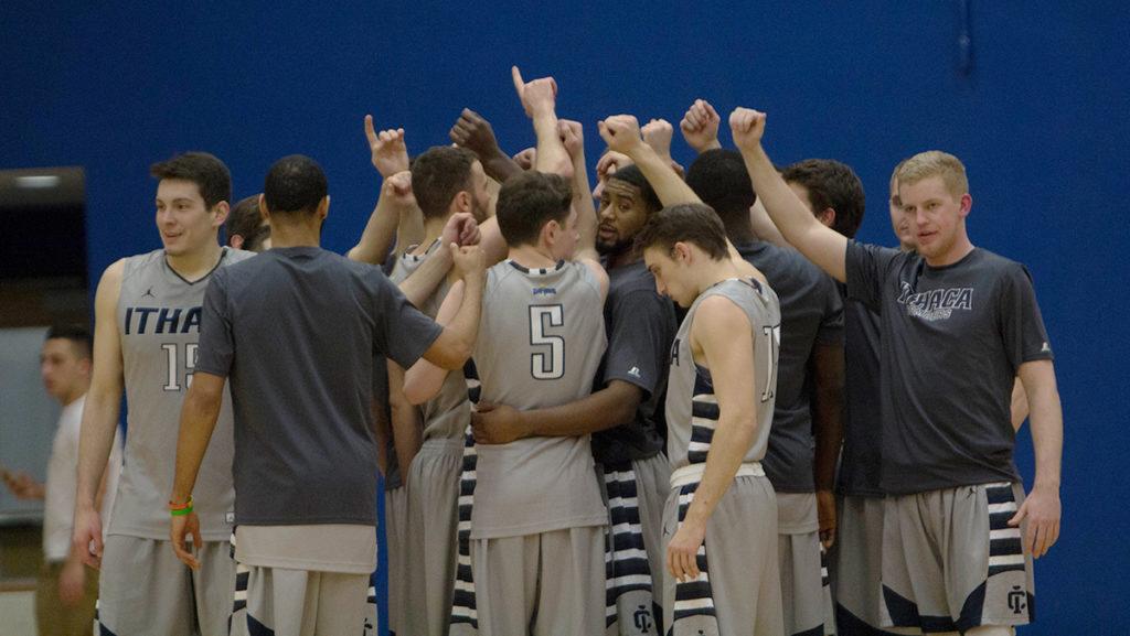 The mens basketball team huddles up during its game Feb. 16 against Houghton College in Ben Light Gymnasium. The Bombers did not make the Empire 8 Championships for the second year in a row.