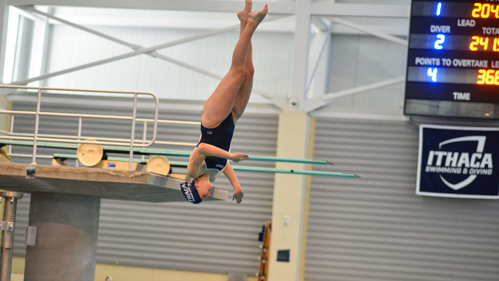 Junior divers Katie Helly dives on the one-meter diving board Jan. 21 against Union College in the Athletics and Events Center.