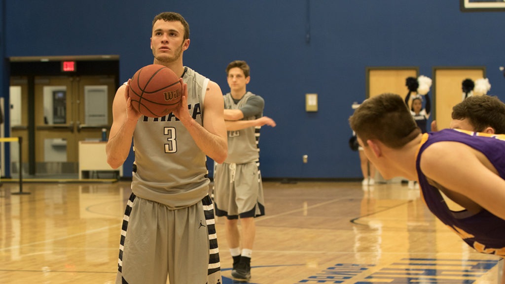 Junior guard Marc Chasin shoots a free throw in the Bombers win against Elmira College 83–67 Feb. 7. With the win, the Bombers snapped its six game loosing streak.
