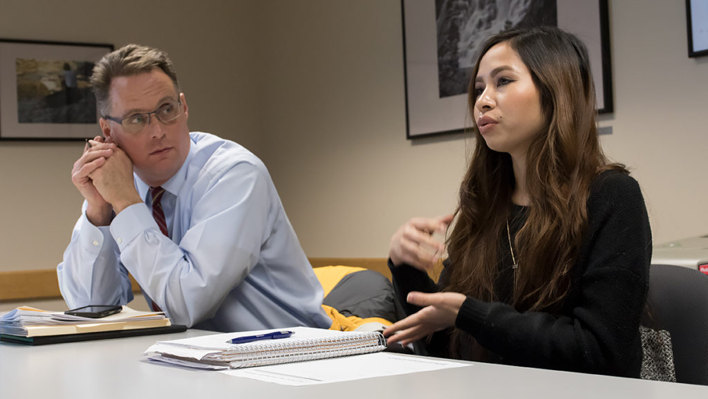 Greg Lischke, director of energy management and sustainability, and Nga Ruckdeschel, a sophomore sociology major,  listen to one of the three finalists for the sustainability coordinator position who were brought onto campus for open interviews in late January and early February. 