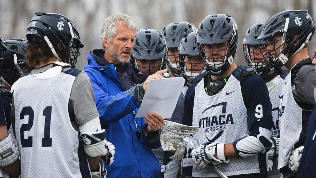 The+mens+lacrosse+team+circles+around+head+coach+Jeff+Long+as+he+goes+over+plays+during+practice+on+March+20+that+would+be+ran+during+its+game+against+SUNY+Oneonta+March+21.