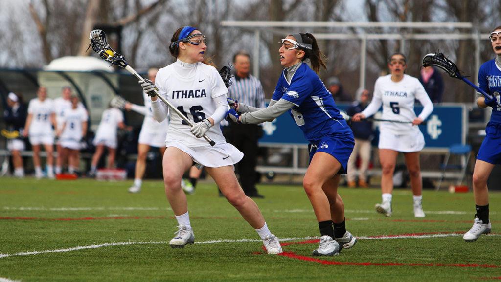 Senior midfielder Morgan Cadwell looks to throw the ball in the Bombers 16–4 win on March 8 over Hartwick College. Cadwell scored three goals