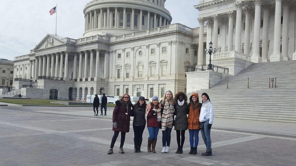 Ithaca College students pose for a picture in Washington D.C. where they volunteered as a part of one of the Alternative Spring Break trips offered by OSEMA. Other students volunteered in Virginia, North Carolina, Canada and Michigan.