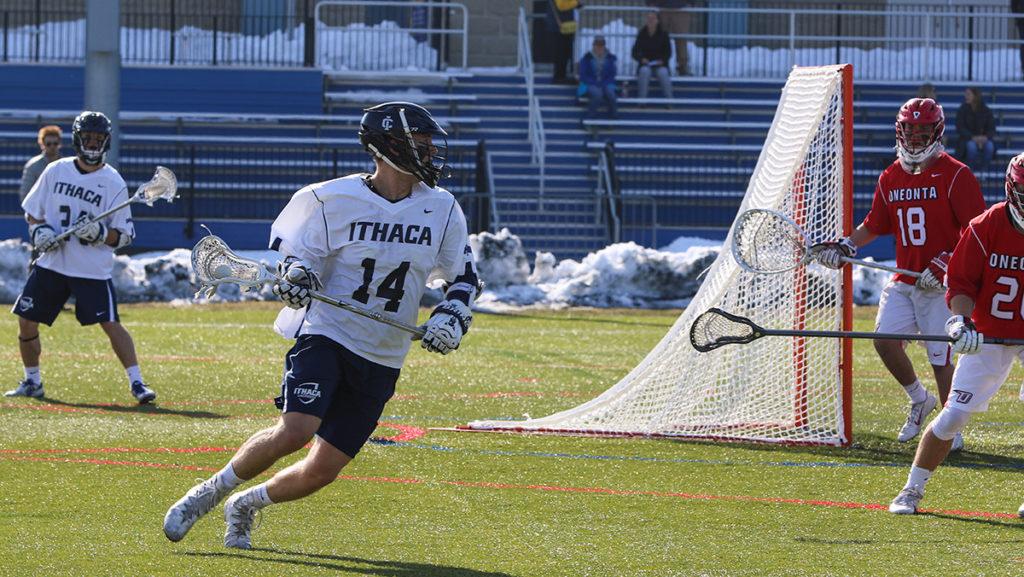 Senior attackman Jack Shumway looks to pass the ball in the Bombers’ 12–6 win against SUNY Oneonta on March 21. Shumway has 37 goals and 11 assists for a total of 48 points.