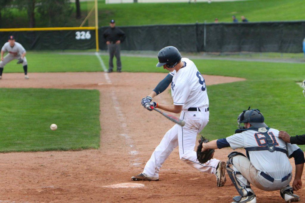 Sophomore outfielder Sam Little swinging at the pitch in the Bombers doubleheader against Utica College at Freeman Field. The team defeated the Pioneers 14–1 and 8–1.