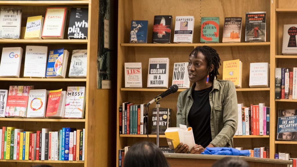 Novelist Yewande Omotoso reads an excerpt of her second novel “The Woman Next Door,” at the kickoff event of the New Voices Festival April 5 at Buffalo Street Books.