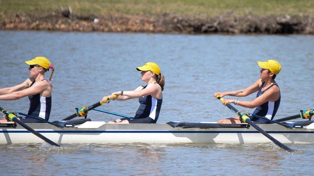 The women's crew competing at the Cayuga Inlet April 8 against Rochester Institute of Technology and University of Rochester.