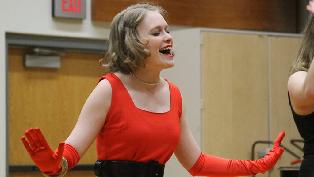 Sophomore Sammie Watts belts out “Let’s Be Bad” dressed as  Marilyn Monroe in Routine Disturbances’ spring showcase April 21. 