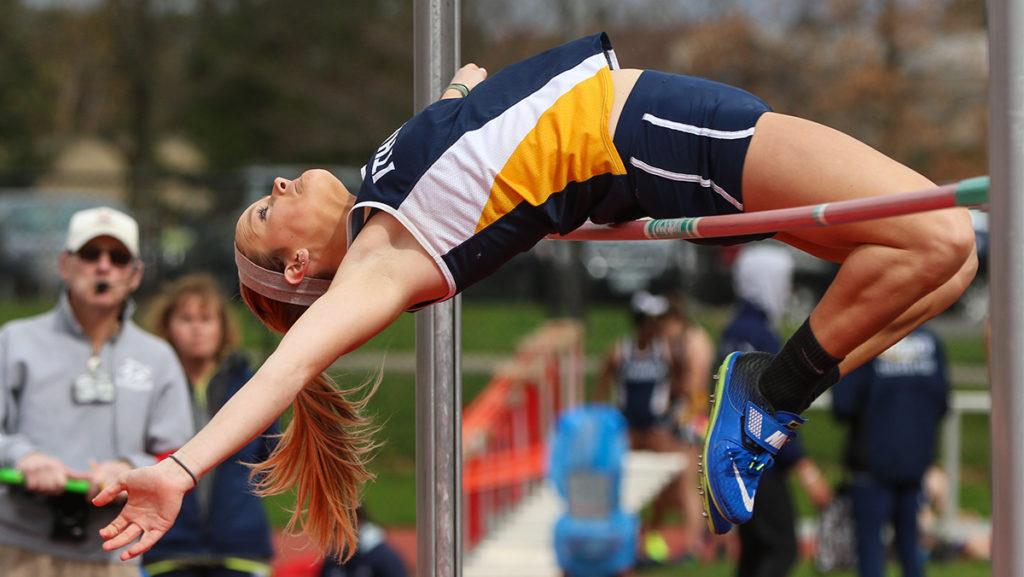 Senior Natalie Meyer competing in the high jump April 25 at Cornell University. Meyer placed fourth in the event with a height of 1.55 meters.