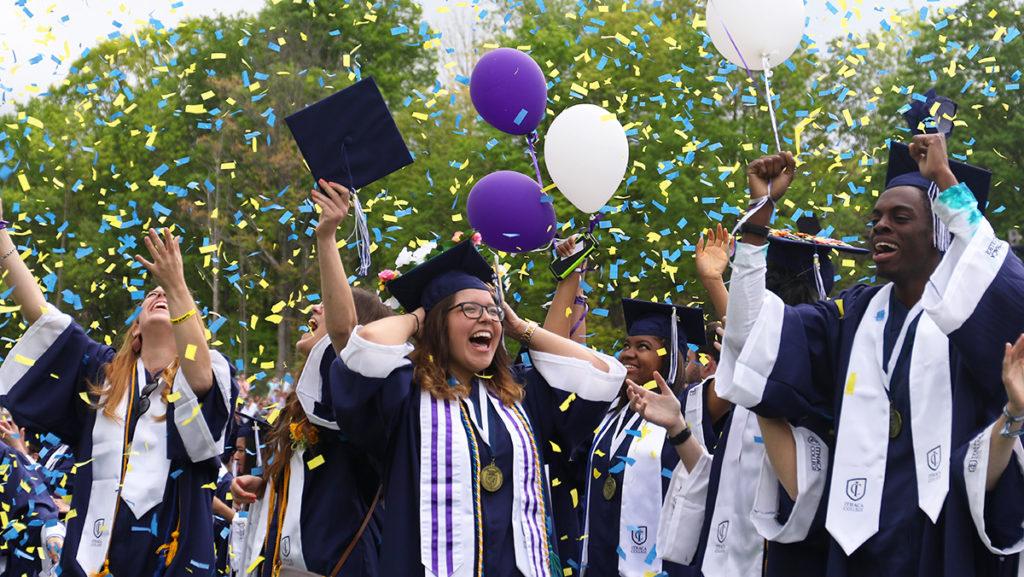 Members of the Class of 2017 celebrate during Ithaca Colleges 122nd Commencement ceremony on May 21. In previous years, graduates neither had their names read nor walked at Commencement.