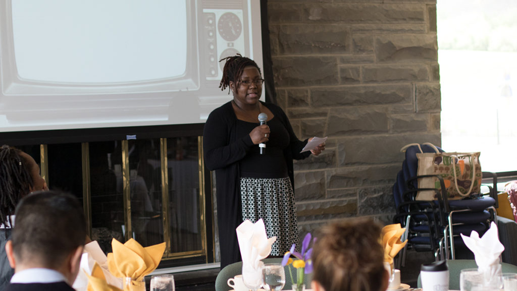 Senior Hayley Warren was one of nine scholars to present about the difference between proactivism and slacktivism at the April 27 CSCRE luncheon.
