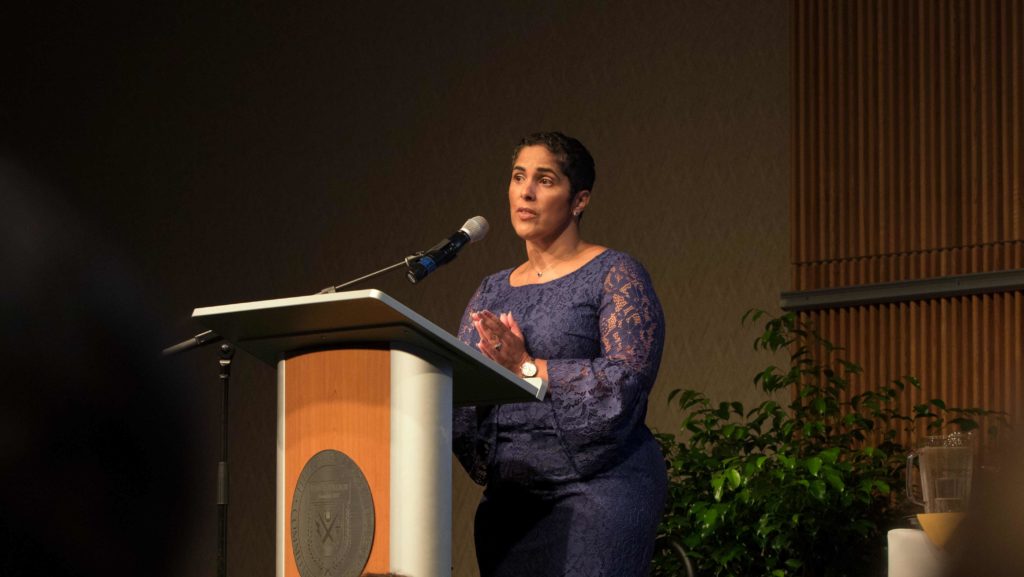 Ithaca College President Shirley M. Collado addresses faculty, staff and students at her first All-College Gathering, held on Aug. 24 in Emerson Suites.