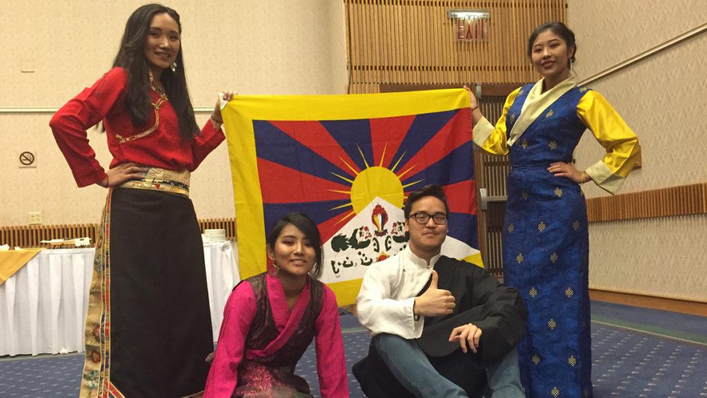 From left, then sophomore Tsering Yangkey, junior Ngawang Chime, Ithaca College freshman Tenzin Chonden and sophomore Tashi Choezom display a Tibetan flag during International week. They each served on Unity Tibets e-board Spring 2017. 