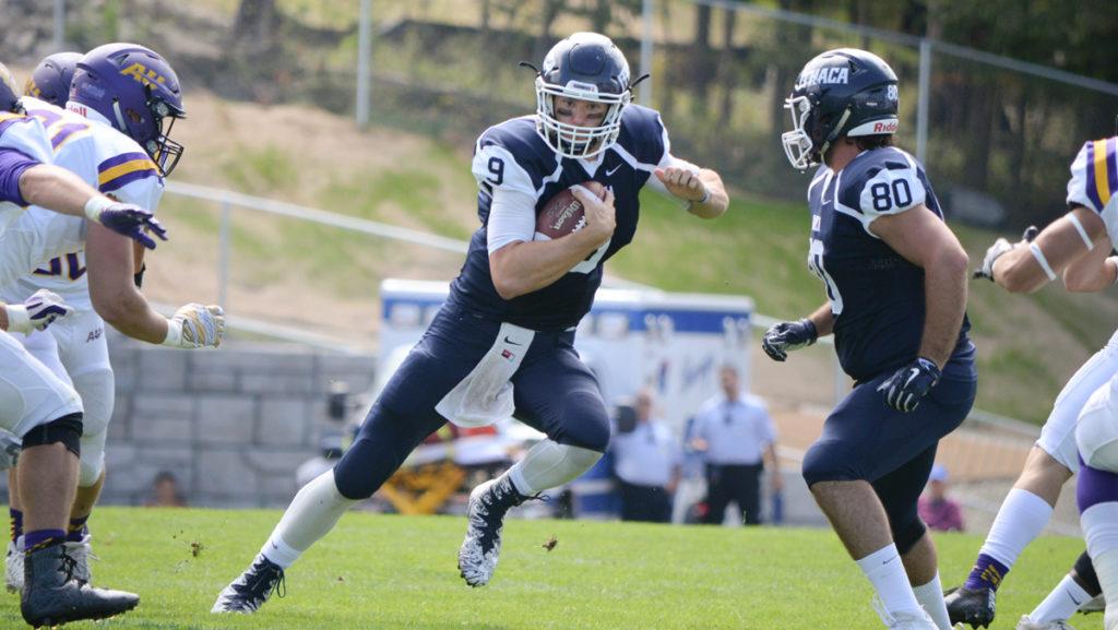 Ithaca College starting quarterback Adam Fron makes a cut against the Alfred University Saxons Sept. 2. 