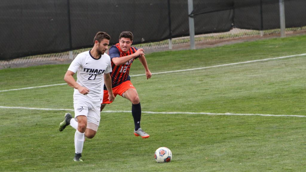 Junior midfielder Nathan Schoen and sophomore midfielder Jack Bizub of Hobart look to get control of the ball. The Bombers lost to the Statesmen 3–0 Oct. 4.
