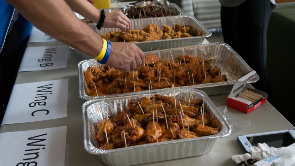 Ithaca College’s American Marketing Association hosted a blind taste test of  chicken wings Oct. 5 to raise money for the club. Attendees paid $5 to eat as much as they wanted. The wings were donated by vendors from the Ithaca community.    	