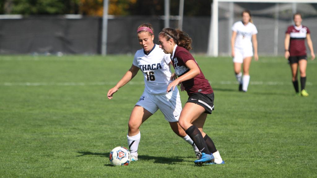 Junior forward Sarah Pirnie looks to stop the ball from freshman defender Georgia Mraz of Union College. The Bombers defeated Union College 3–1 Oct. 14.