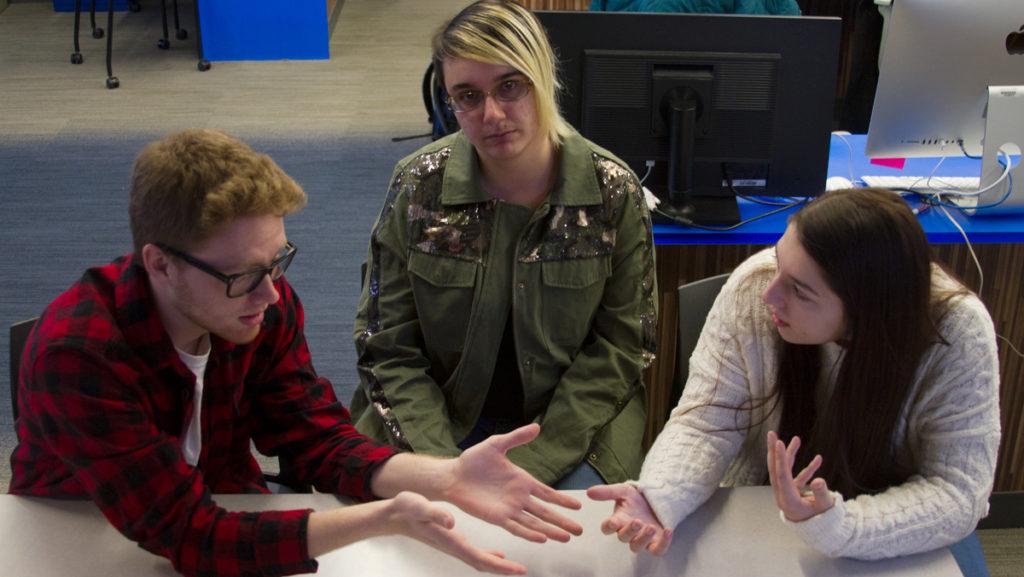 Senior Sloane Kazim (center) writes that mansplaining hurts transgender students, too, and that nonbinary people need to be included in conversations about dismantling patriarchal structures.