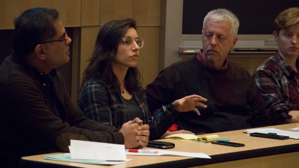From left, Raza Rumi Ahmed, scholar-in-residence in the Department of Journalism; Sarah Grunberg, lecturer in the Department of Sociology; Pete Meyers, founder and coordinator at the Tompkins County Workers’ Center; and sophomore Lillian Rushing, a residential assistant at the college, spoke about worker exploitation at the SLA teach-in on Dec. 7.