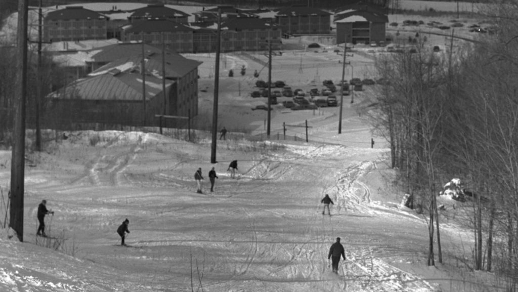 The hill by Boothroyd Hall was used as a ski slope for students on campus. A tow rope at the bottom of the hill for skiers to hold onto took them up past what is now J-Lot behind the Towers residence halls. Courtesy of C. Hadley Smith