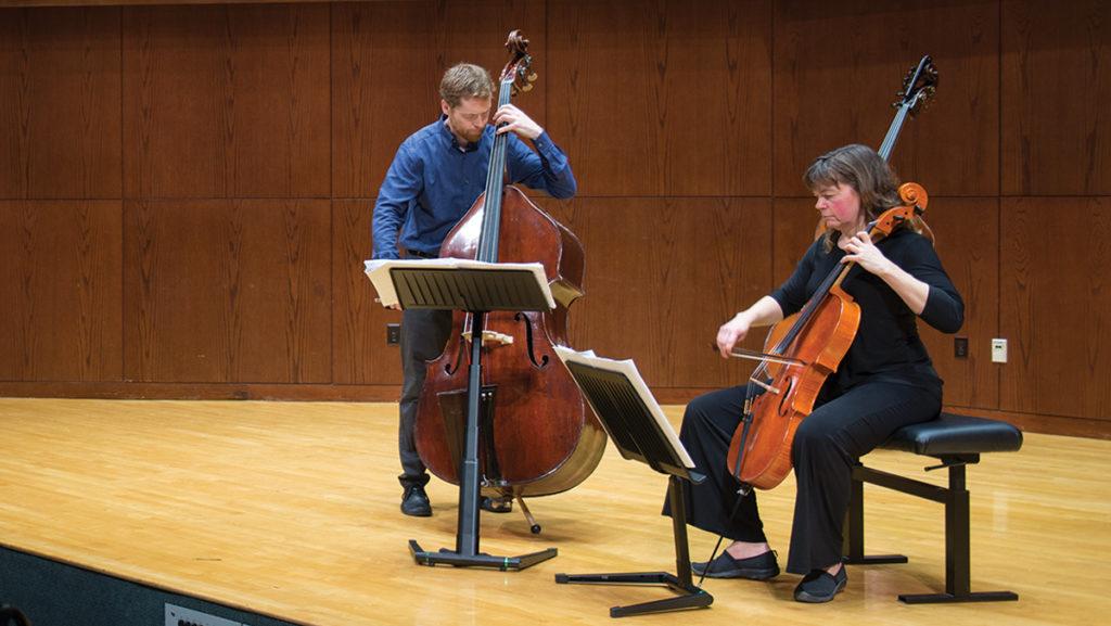 Nicholas+Walker+and+Elizabeth+Simkin%2C+associate+professors+in+the+Department+of+Performance+Studies%2C+performed+at+a+faculty+recital+in+the+Hockett+Family+Recital+Hall+on+Jan.+29.+Walker+played+double+bass%2C+and+Simkin+played+violoncello.