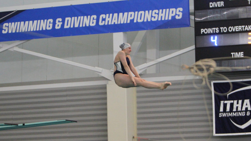 Senior diver Katie Helly competes in the 1-meter dive during the Liberty League Conference Championships on Feb. 25.