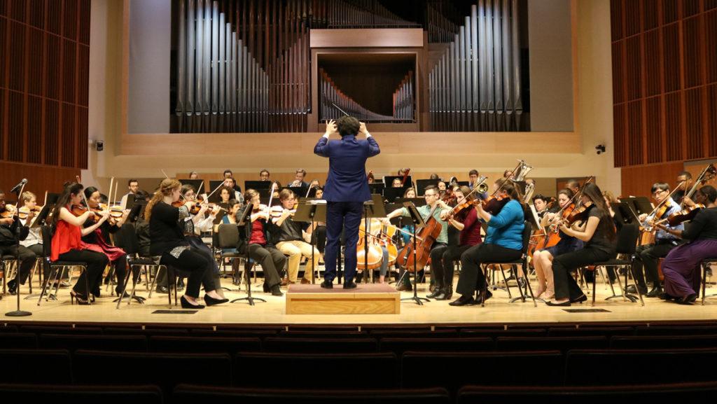  Un/Pitched, a collaboration between Ithaca College and Cornell University faculty and students, performs at the concert “The Sonic Sandbox Orchestra” on Feb. 25 in Ford Hall. Composition graduate student Keehun Nam conducts the orchestra. 