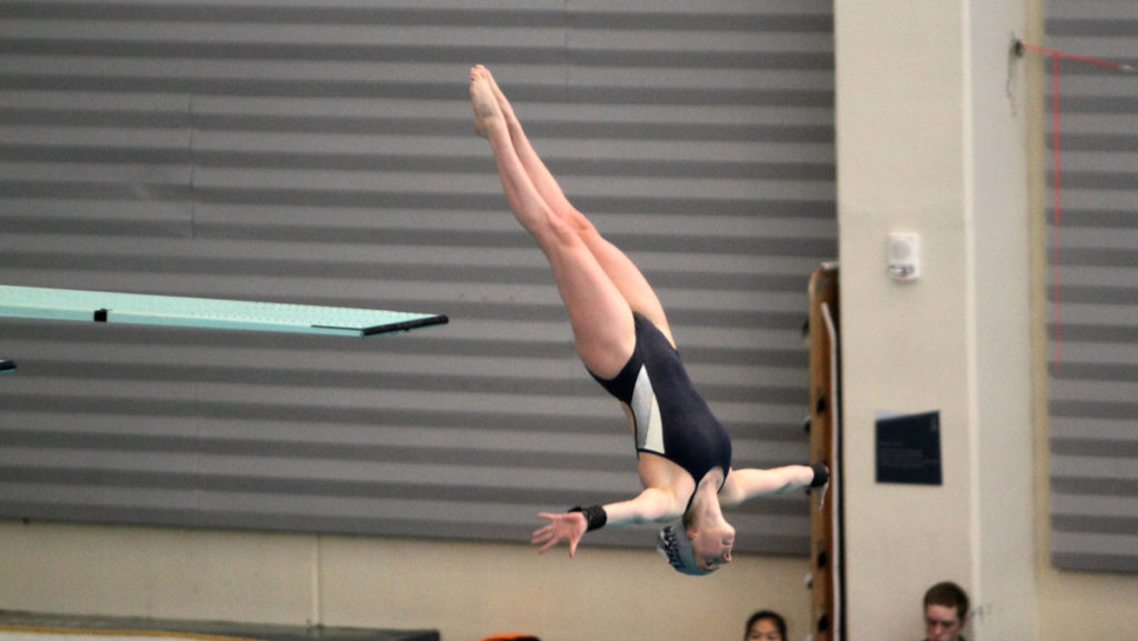 Senior Alyssa Wishart dives at the NCAA Division III Diving Regionals. She finished ninth in the three-meter dive with a score of 413.45.