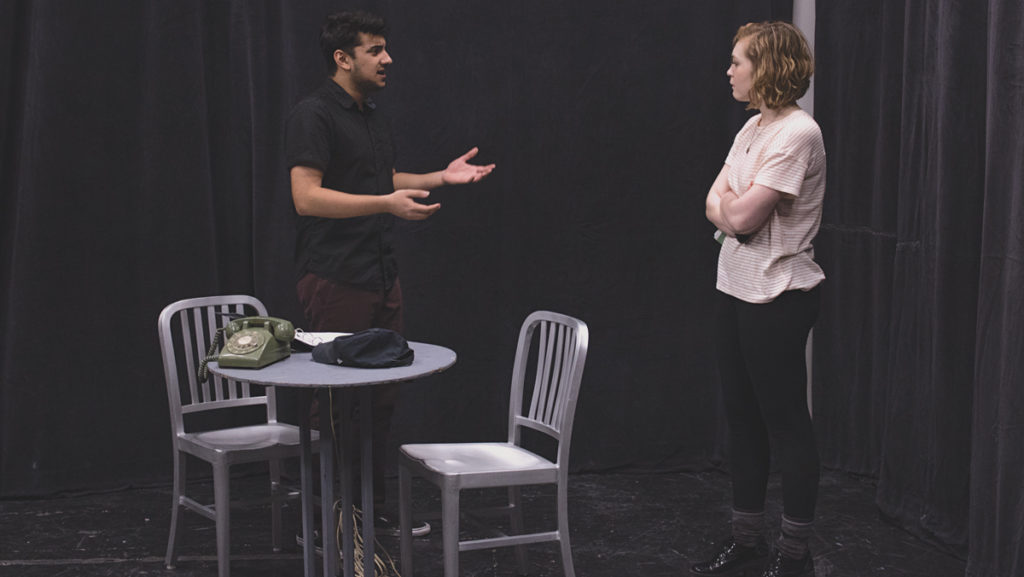 Freshmen Dhruv Iyengar and Katie Nevils rehearse a scene from Kenneth Lonergan’s play “This is Our Youth.” IC Second Stage,  a student-run theatre group, is staging the production, which tells the story of three teenagers entering adulthood during the Reagan era.