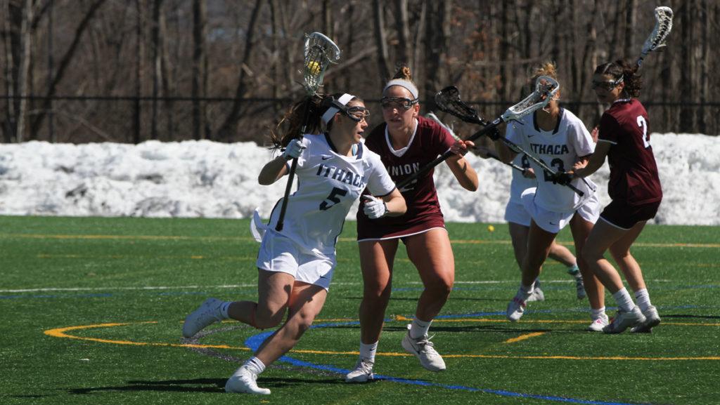 Junior attack Allie Panara goes up against Megan Fitzgerald, Union College junior defender, during the Blue and Golds win March 31.