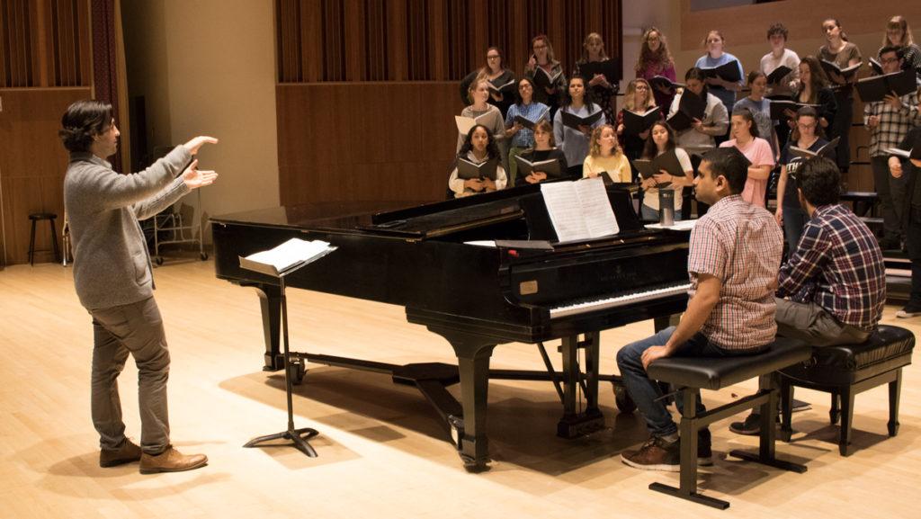 Matthew Recio 13 worked with the Ithaca College Campus Choral Ensemble to rehearse his piece How to Survive Vesuvius for its performance April 24. 