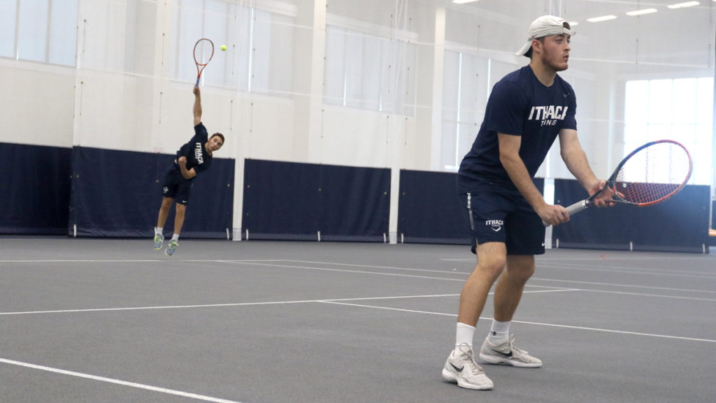 Junior Garrett Boleslav and sophomore Liam Spiegel compete during their doubles match against Connecticut College on April 29.