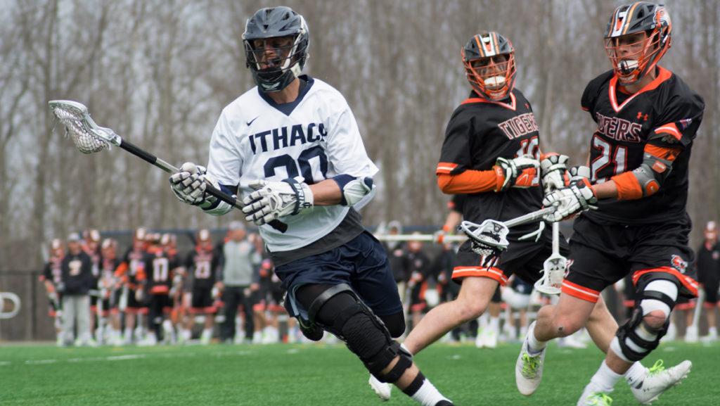 Freshman defender Drew German cradles the ball during the Bombers loss against the Rochester Institute of Technology on April 11 at Higgins Stadium.