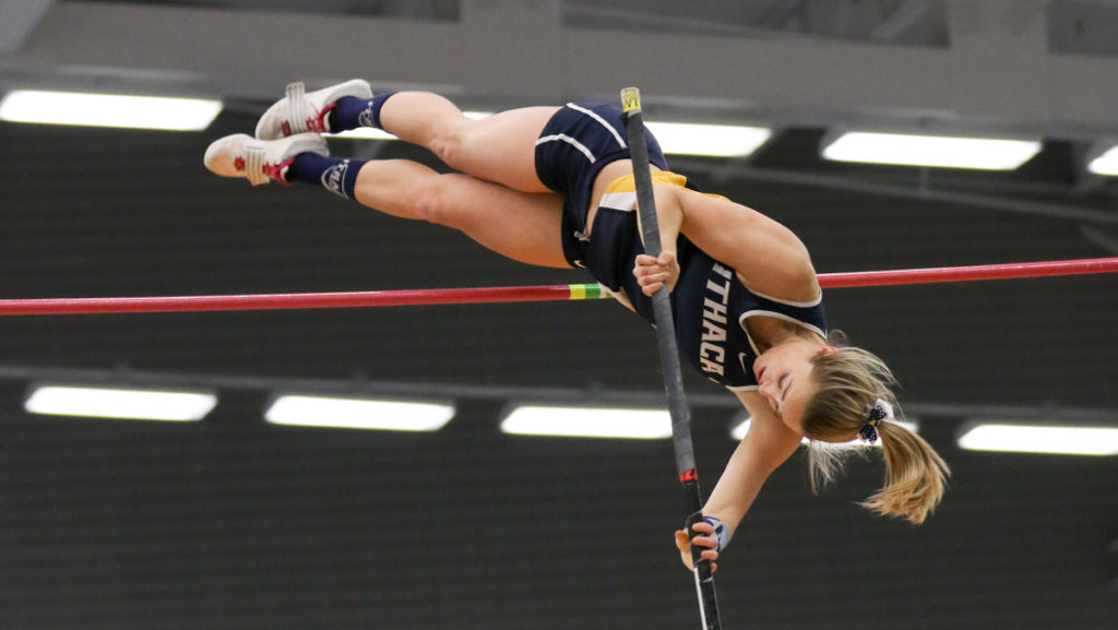 Graduate student Katherine Pitman pole-vaults at the Ithaca Bomber Invitational and Multi on Feb. 3 at the Athletics and Events Center.