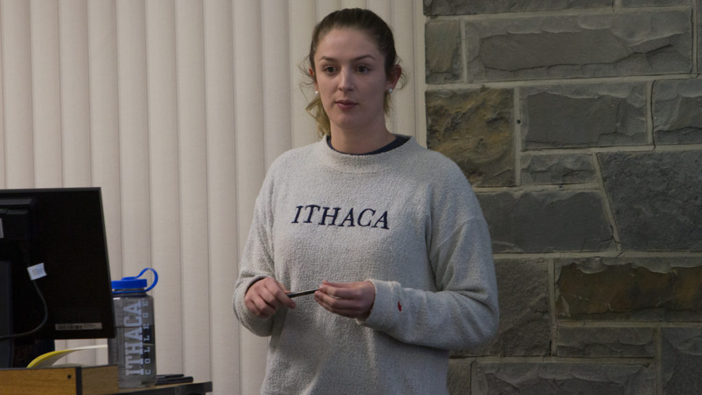 Gabby Picca, vice president of business and finance, presents amendments to the Allocations Handbook during the Student Governance Council Meeting on April 2.
