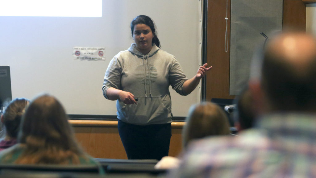 Junior biology major Julia Muuse presents her research about solar ultraviolet radiation on May 1 at the annual Biology Symposia.