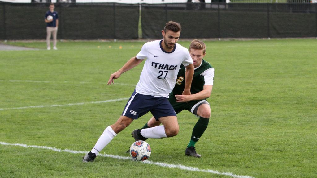 Freshman midfield Nate Schoen looks to pass the ball upfield during the Bombers 0–0 tie against Clarkson University on Sept. 22.