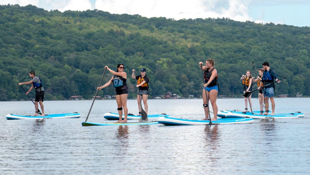 Students took a stand-up paddleboarding class Sept. 14–16. The students went to  Stewart Park in Ithaca and Owasco Lake in Moravia, New York, to practice their skills.