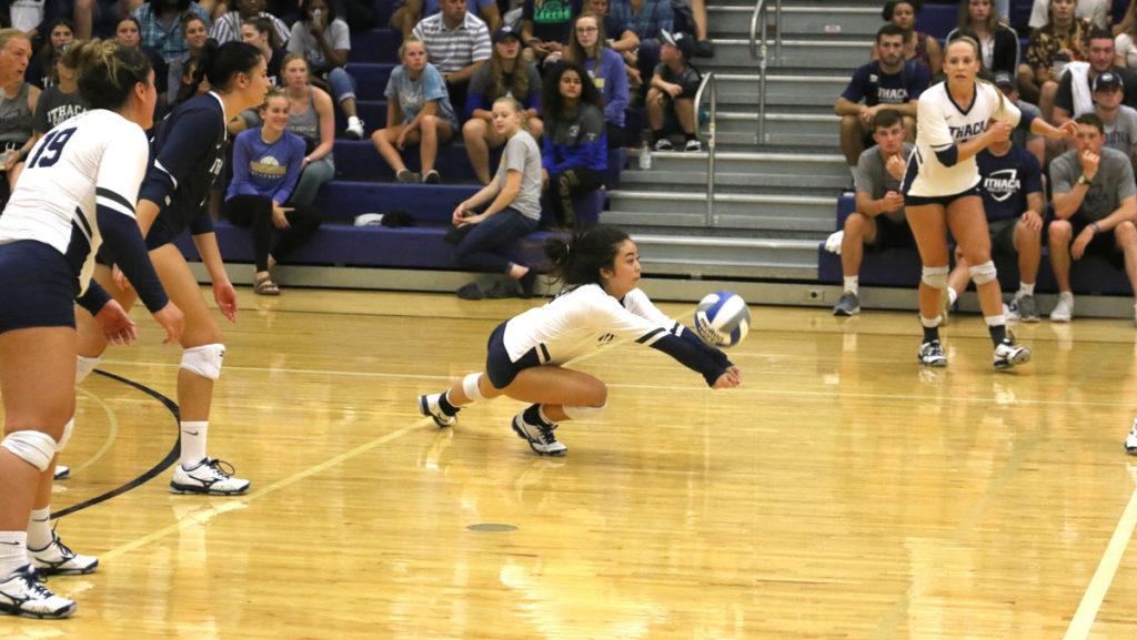 Freshman libero Jordyn Lyn Hayashi digs the ball during the Blue and Gold’s loss against Calvin College on Aug. 31. Hayashi has played in all 23 games for the Bombers this season.