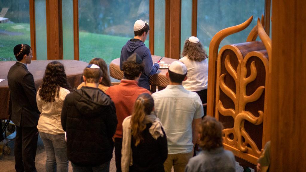 Members of the Ithaca College and local community attended a vigil in Muller Chapel Oct. 28 held to honor the victims and survivors of the shooting at the Tree of Life Synagogue in Pittsburgh Oct. 27. Eleven members of the Jewish community were murdered at the scene. 