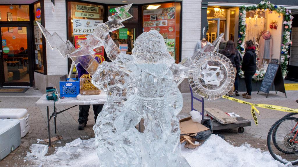 An+ice+sculpture+stands+in+front+of+shops+on+The+Commons+during+last+years+Ice+Fest.+The+2018+Ice+Fest+will+last+from+Dec.+6+to+7+and+coincides+with+a+Chowder+Cook-off.
