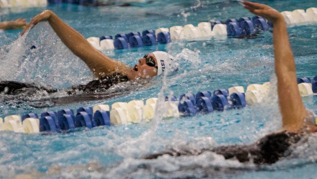 Junior Alex Estanislau competes in the womens 200-yard backstroke during the Liberty League Championships in Kelsey Partridge Bird Natatorium on Feb. 23. The womens team won their first league title with 1254.5 points.