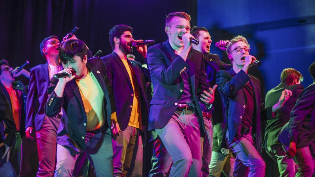 From left, freshman Karl Meyer, junior Tommy Koo, sophomores David Shane and Connor Shea and junior Josh Wahl perform with their all-male a cappella group, Ithacappella, on March 1 in the Emerson Suites in a collaborative fundraising concert for LGBTQ youth.  