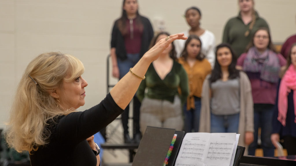 Professor Janet Galvan rehearses with the Ithaca College Choir. Galvan was an artist in residence at Mississippi State University in September and acted as a guest conductor.