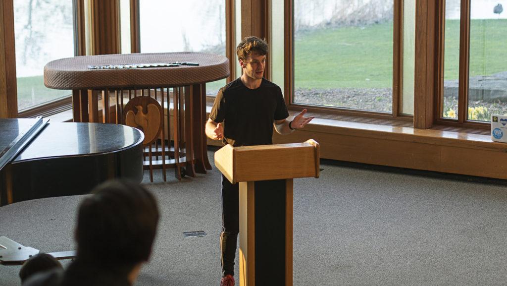 Senior Benjamin Laufer spoke during the colleges first Holocaust memorial service April 22 in Muller Chapel. The event was hosted by the Student Alliance for Israel (SAFI) to honor victims of the Holocaust.