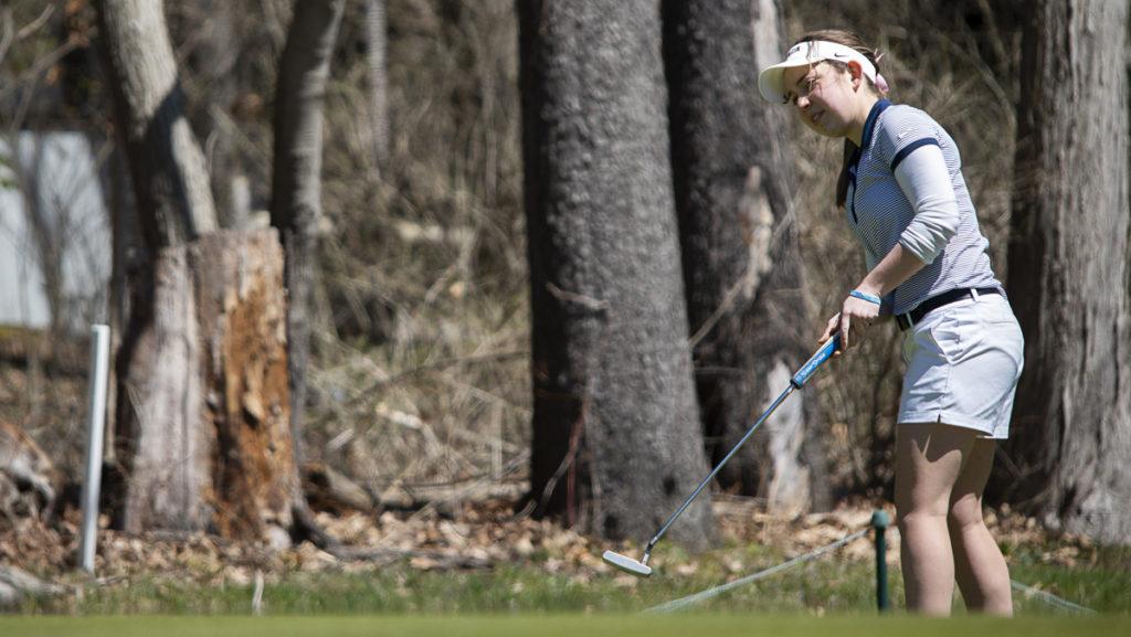 Then-sophomore golfer Peyton Greco makes a putt during the Ithaca College Invitational on April 22, 2018. Greco, a junior, is currently the most senior member of the golf team.